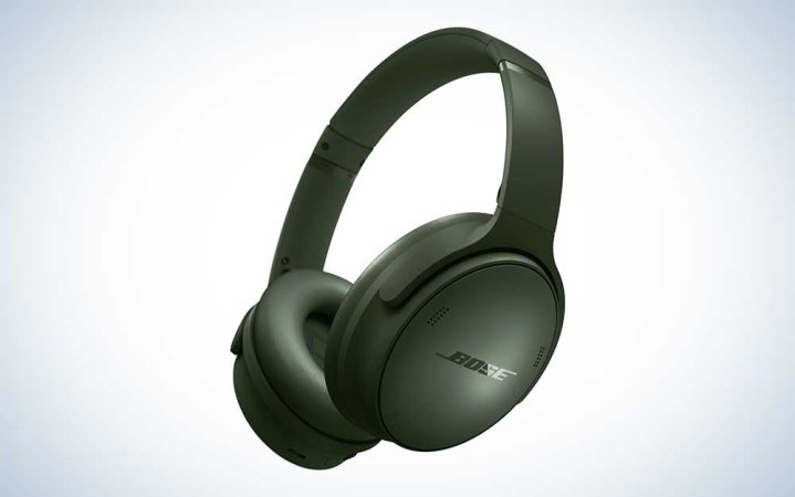  A pair of green Bose quiet comfort headphones on a plain background.