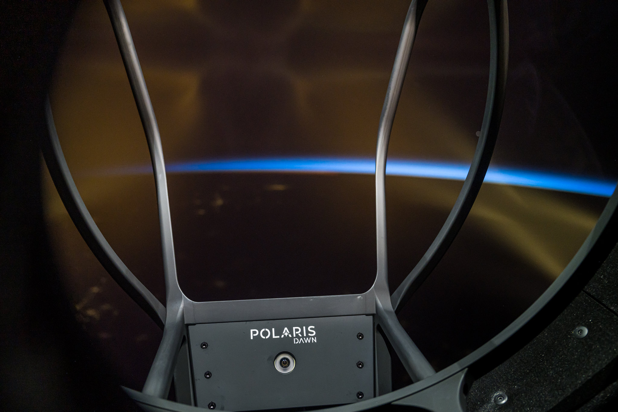 polaris dawn latter seen above a dark earth