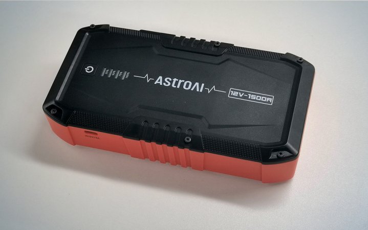  Red and black AstroAI S8 budget portable jump starter on a white counter