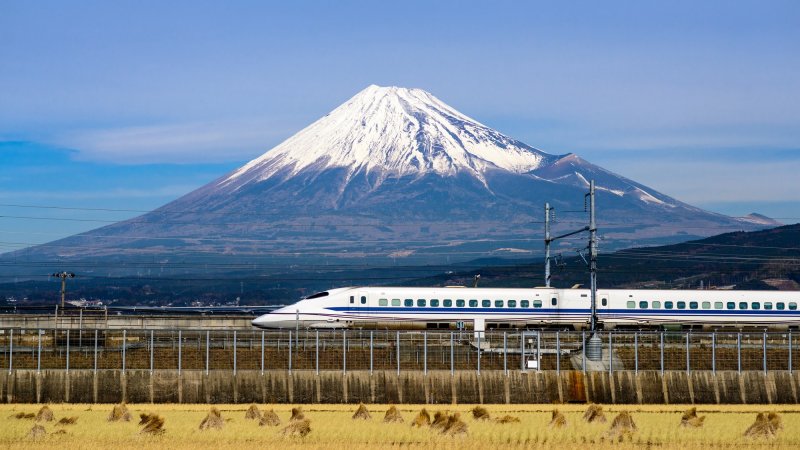 A bullet train passes below Mt. Fuji in Japan.