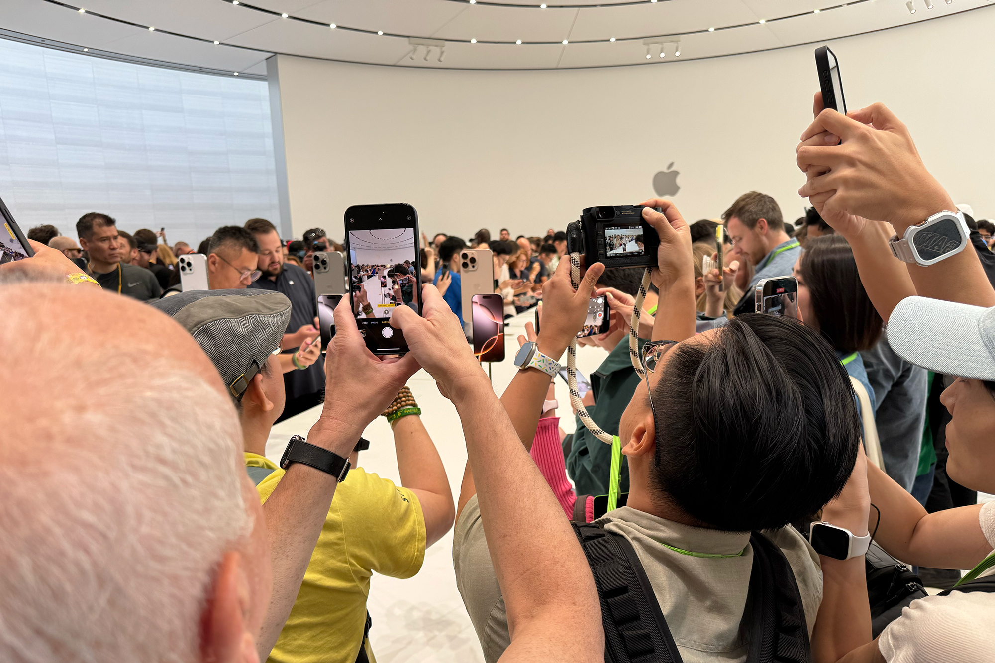 Science and Nature news People taking photos of the new iPhone 16 Pro with their iPhones