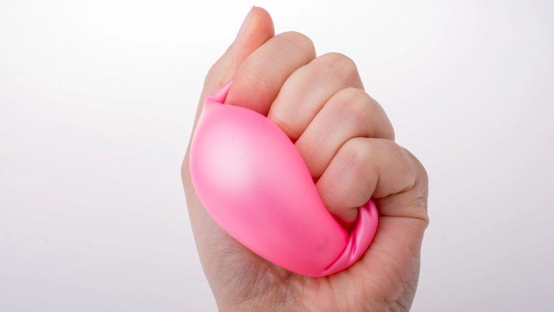 hand squeezing balloon