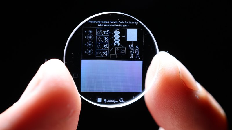 Close up of memory crystal disc encoded with human genome