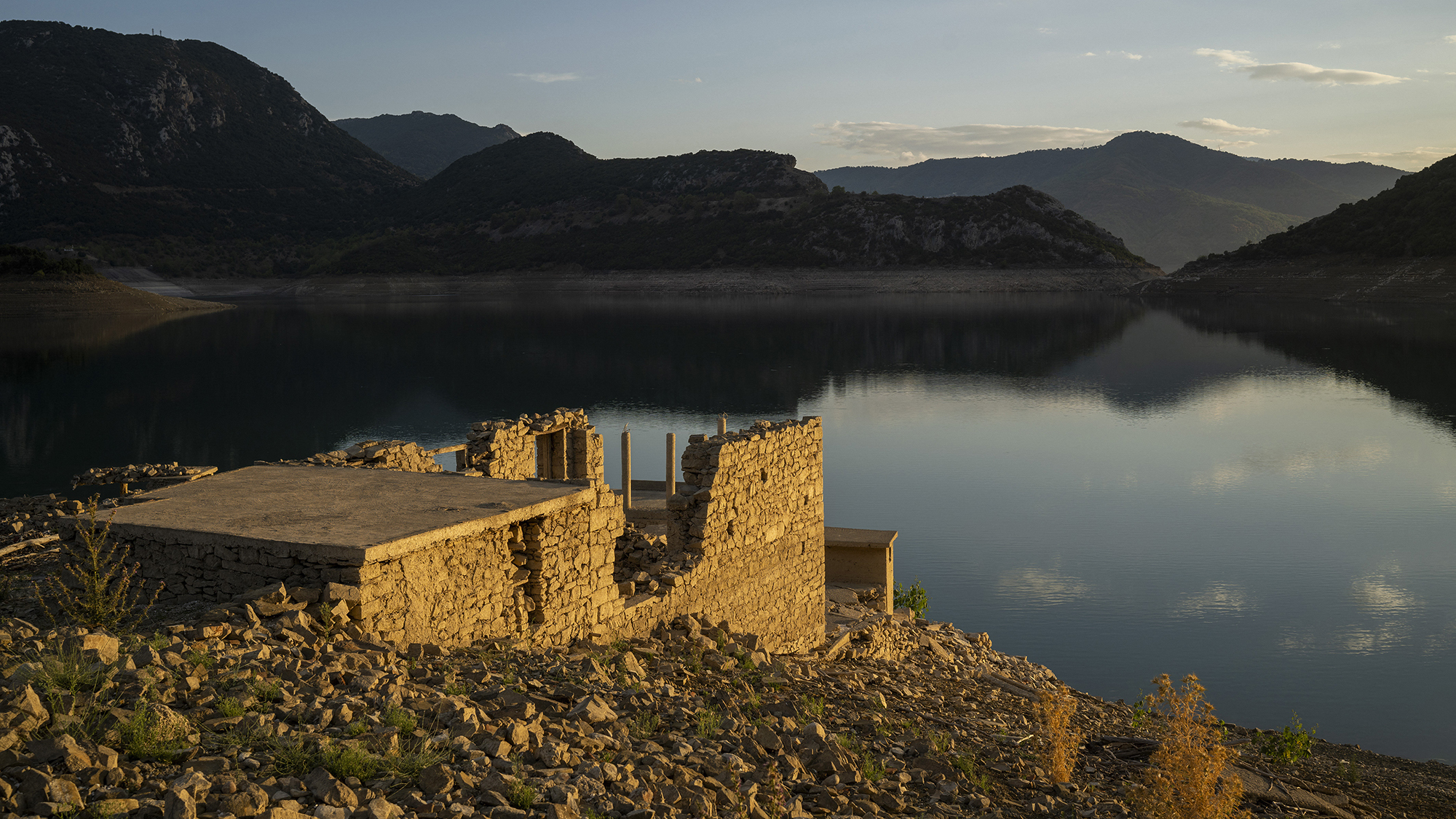 remnants of a sunken village in a very dry reservoir