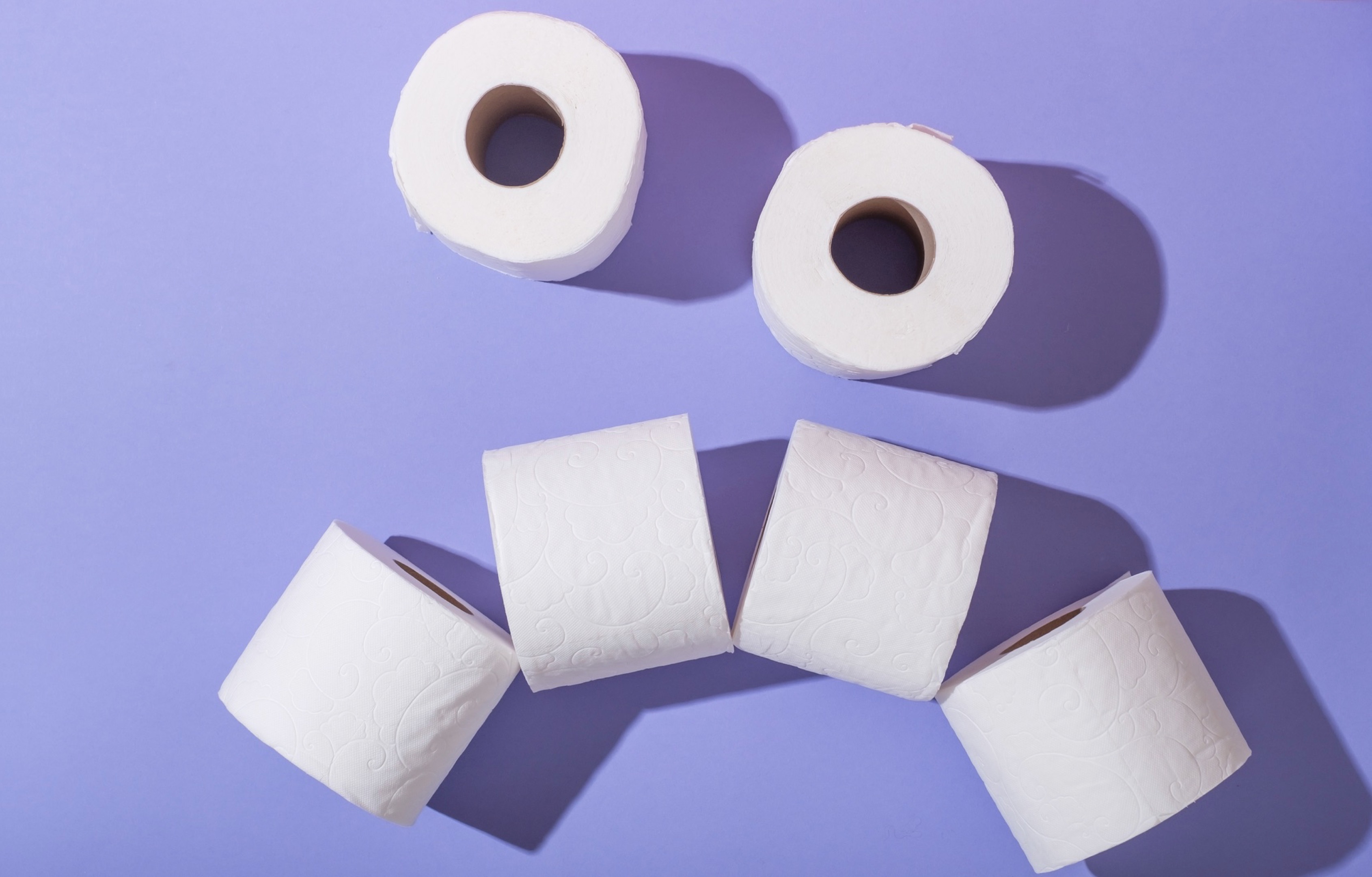 toilet paper shaped like sad face