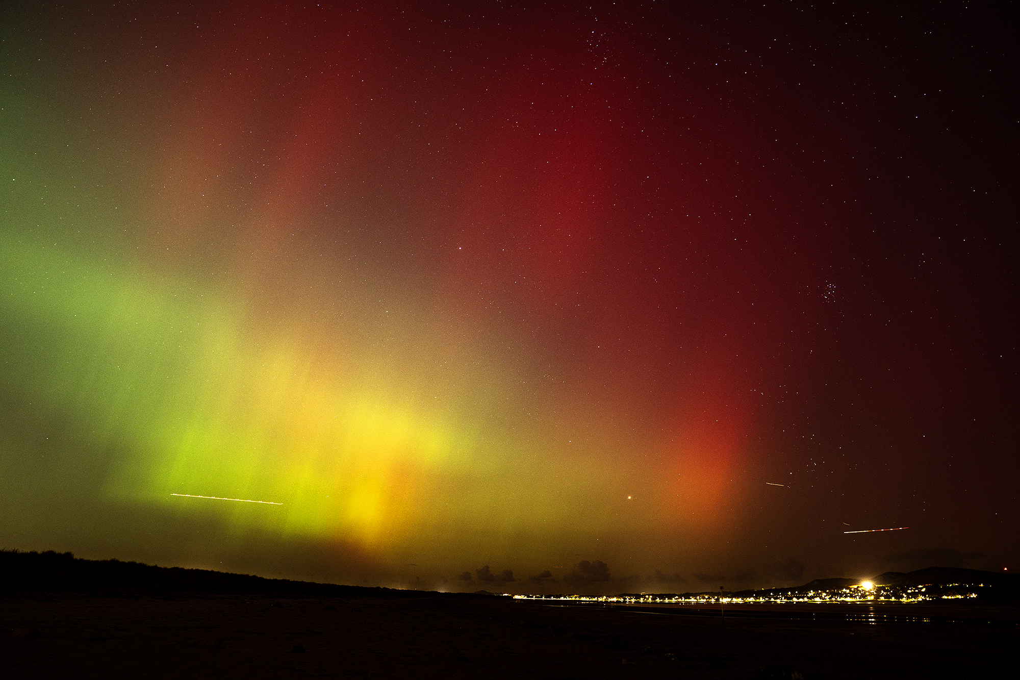 The Northern Lights, also known as aurora borealis, on display in the skies over Dublin seen from Bull Island. Picture date: Thursday October 10, 2024. (Photo by Brian Lawless/PA Images via Getty Images)