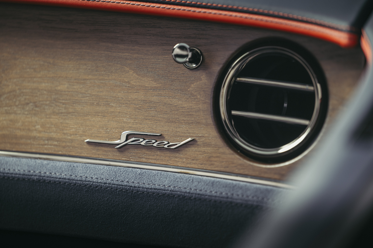 the AC/heat hole in car on wooden dashboard