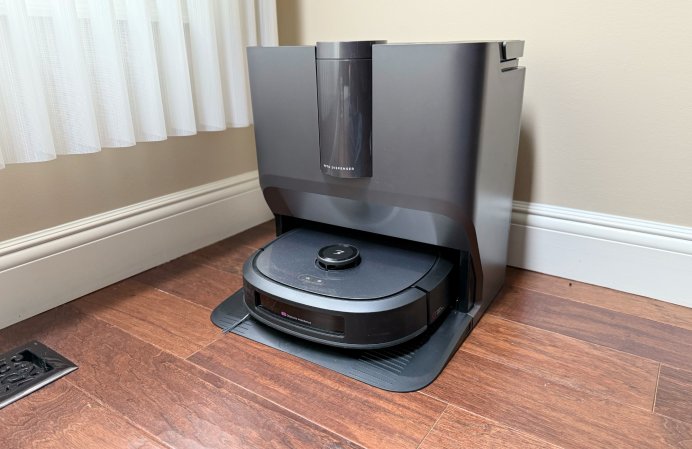  Eureka J20 robot vacuum in the corner of a room.