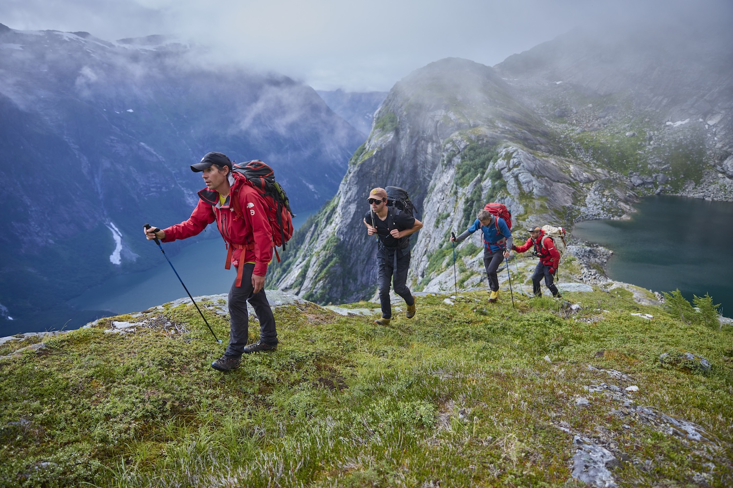 Alex Honnold, Taylor Shaffer, Tommy Caldwell and Waldo Etherington hiking up and over a mountain pass between Upper Scenery Lake and the Witches Cauldron. (National Geographic/Matt Pycroft)