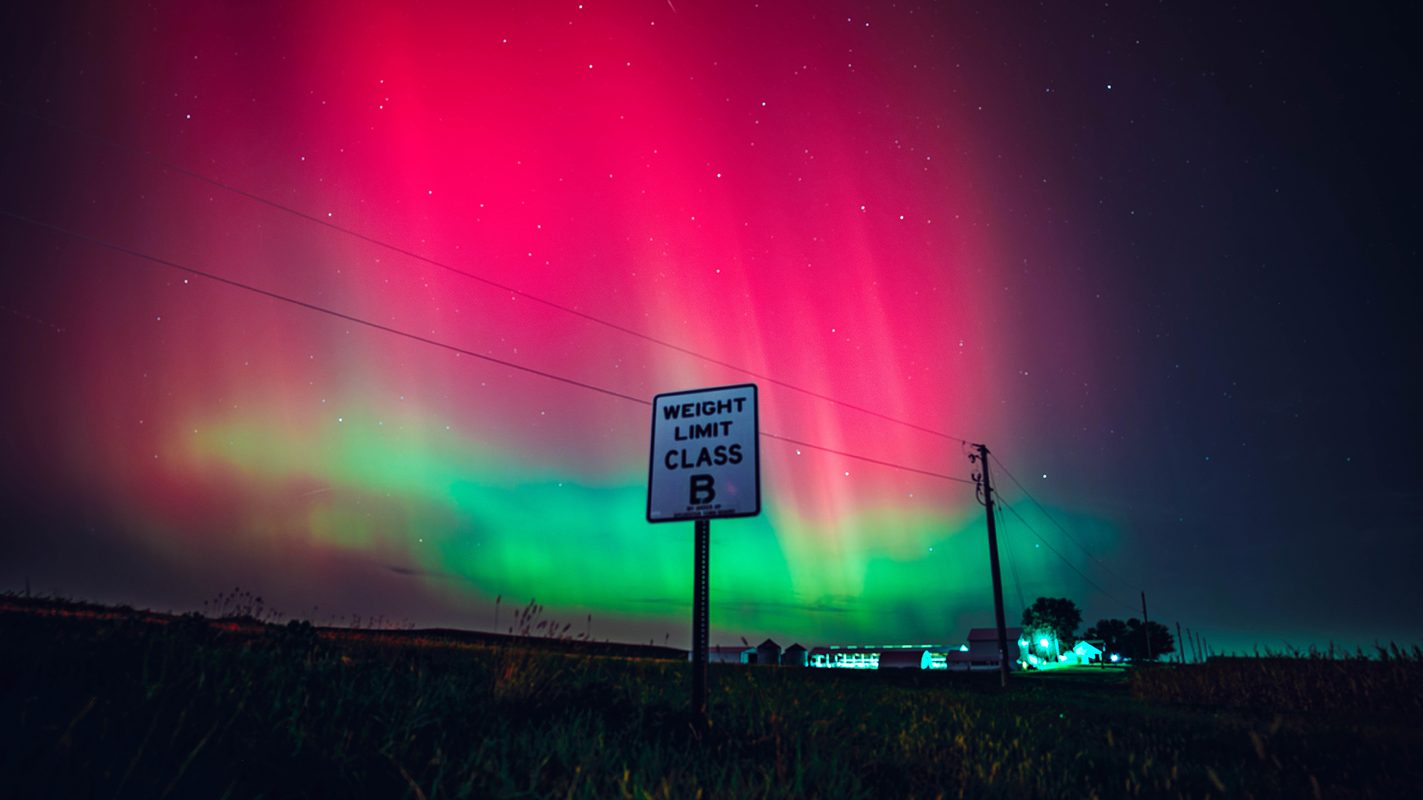 The night sky in Wisconsin glows with the Northern Lights as a geomagnetic storm brings vibrant pink and green colors to a majority of the northern states.