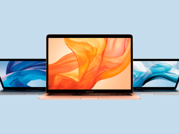 MacBook Airs on a plain background.