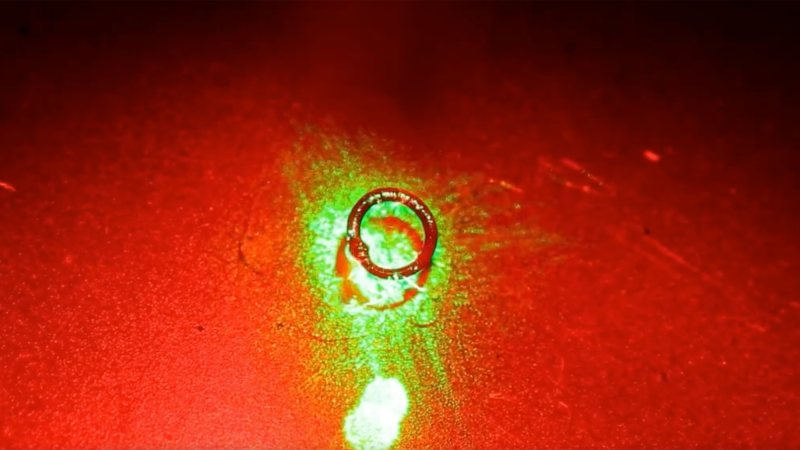 Video Still: Optically driven rotation of ZEEM torus on an air–glycerol interface.