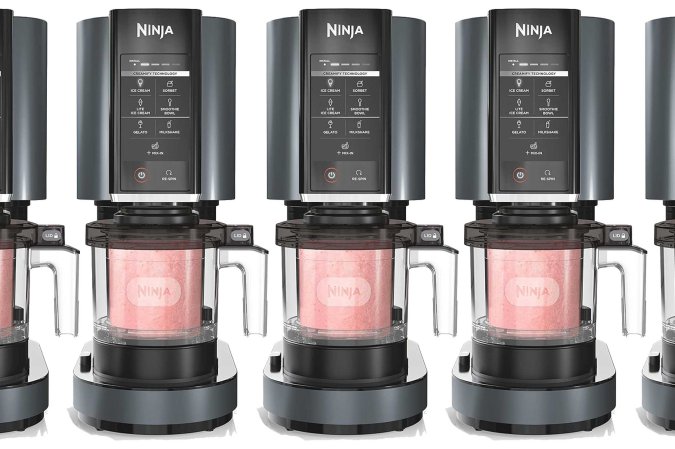 Four Ninja Creami appliances in a pattern on a plain background.