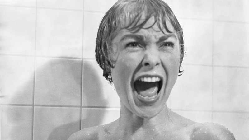 Janet Leigh screaming during iconic shower scene in Alfred Hitchcock's 'Psycho.'