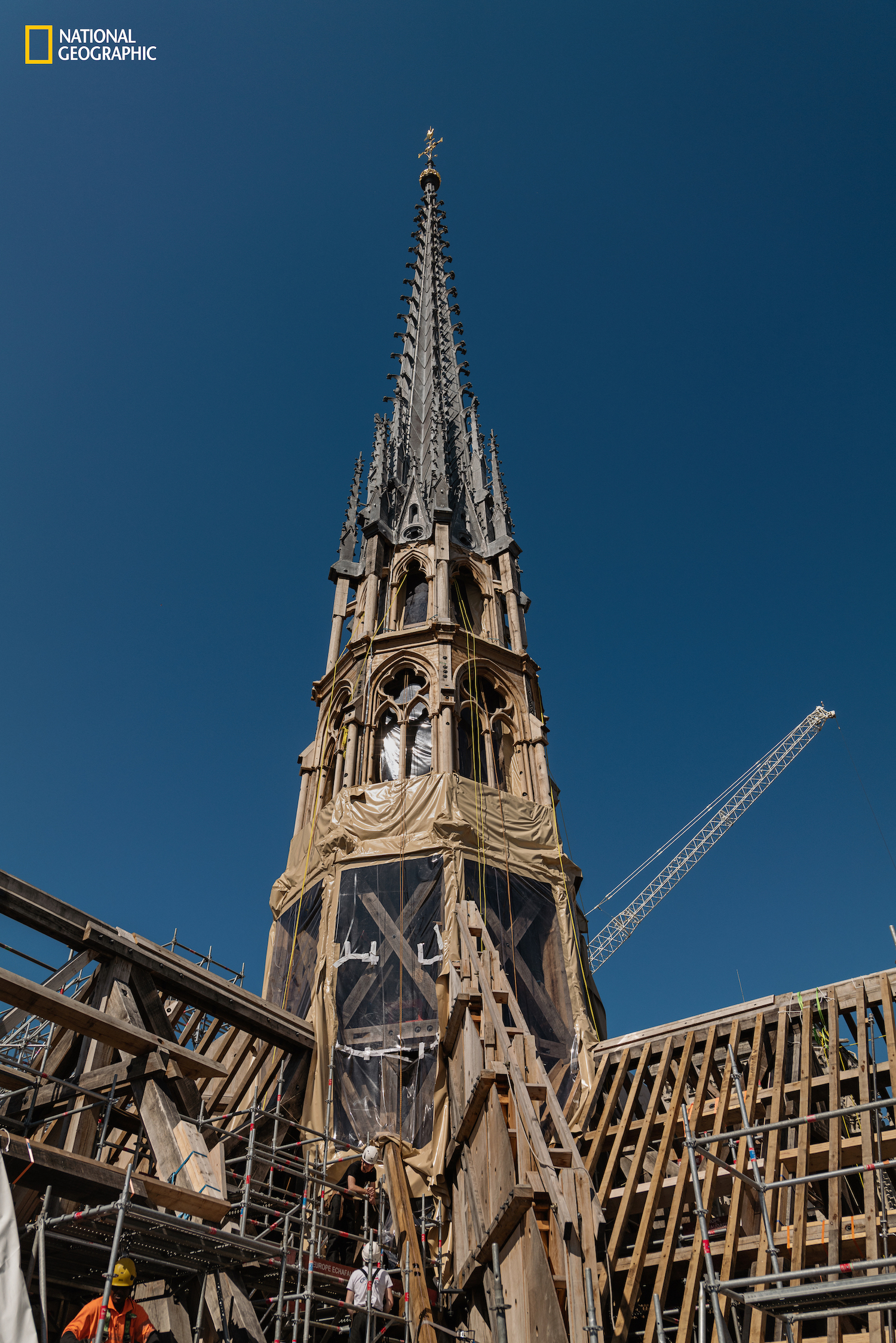 AN ICON REBORN: After a devastating fire ravaged the centuries-old Notre Dame Cathedral, a monumental task for those rebuilding the sacred structure was to blend the styles and innovations of three eras of construction—medieval, 19th century, and today—into one. Here’s how they did it. (Photo by Tomas van Houtryve for National Geographic)