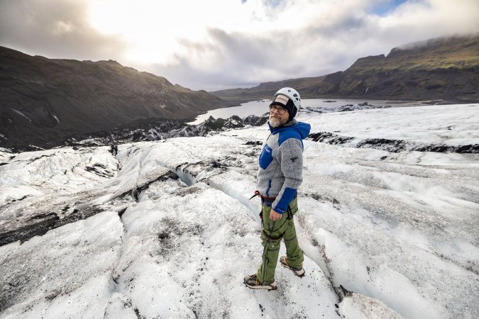 Tony Ware standing on top of an Icelandic glacier modeling Columbia Sportswear Omni-Heat Arctic