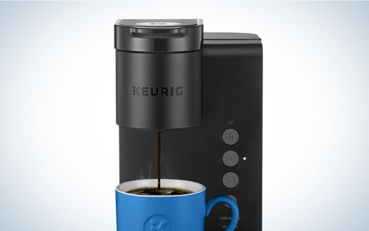  A Keurig coffee machine making coffee into a blue mug on-sale for early Black Friday at Walmart