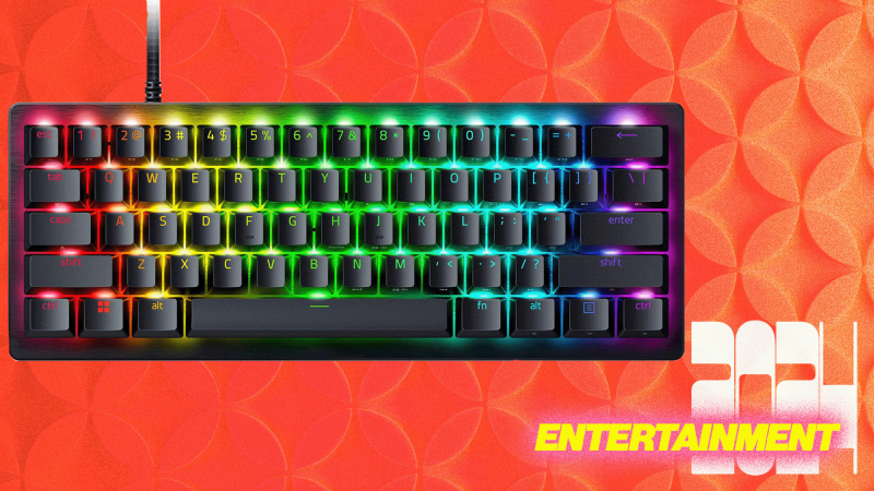  a keyboard with rainbow lights under keys