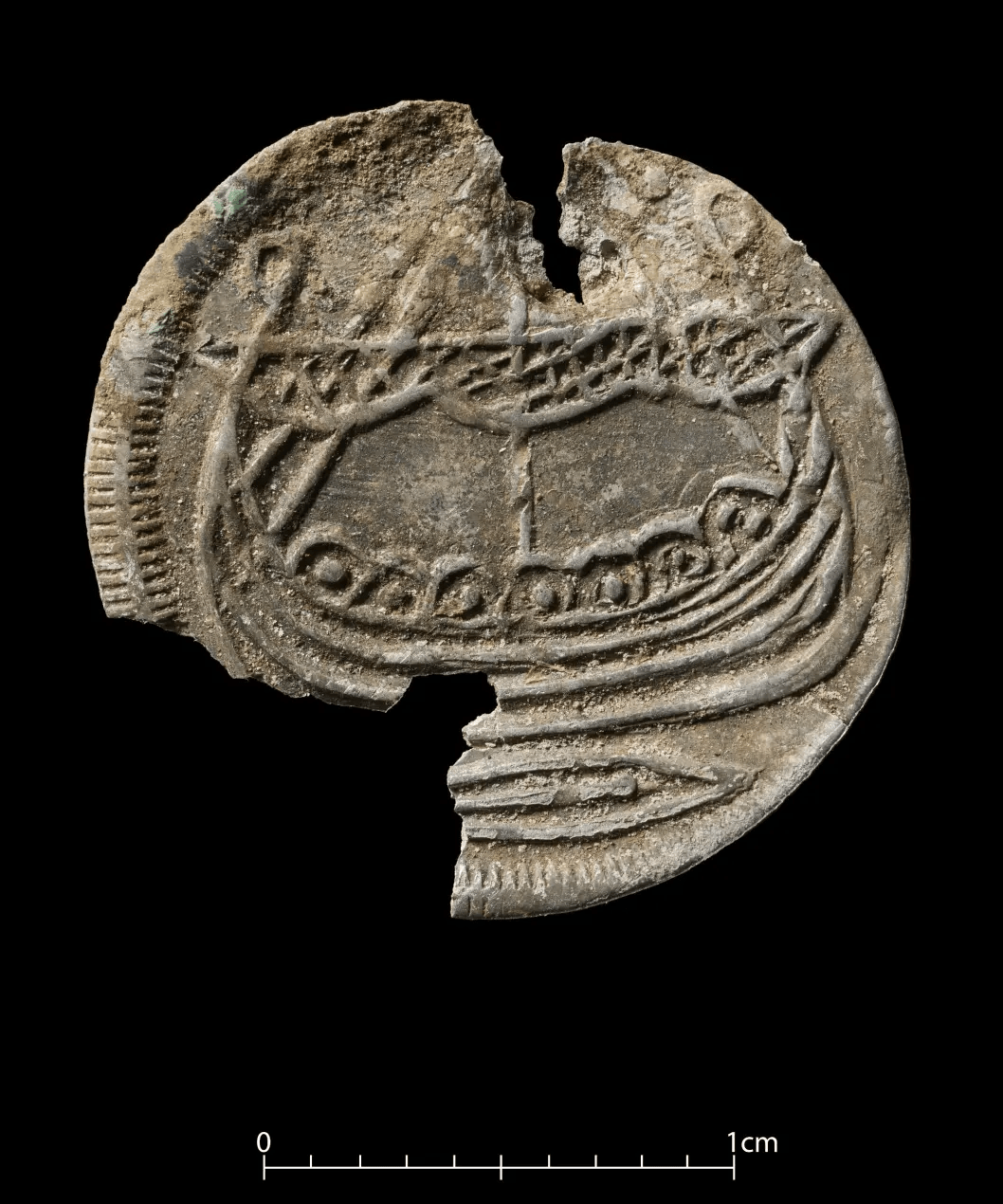 Viking coin with ship on it