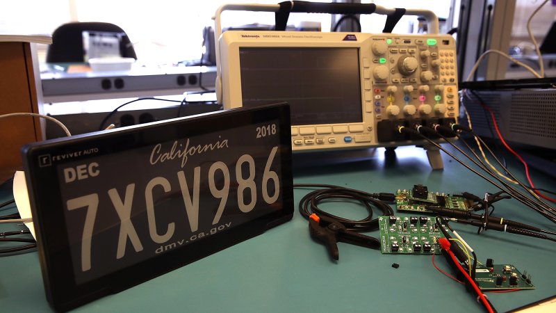 A digital license plate made by Bay Area company Reviver Auto is displayed at Reviver Auto headquarters on May 30, 2018 in Foster City, California.