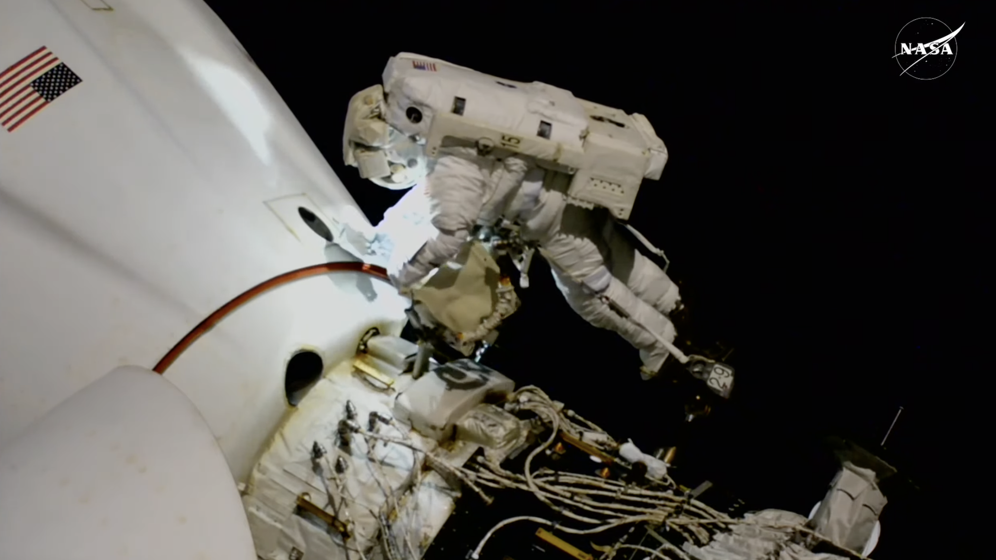 NASA astronaut working during spacewalk outside ISS