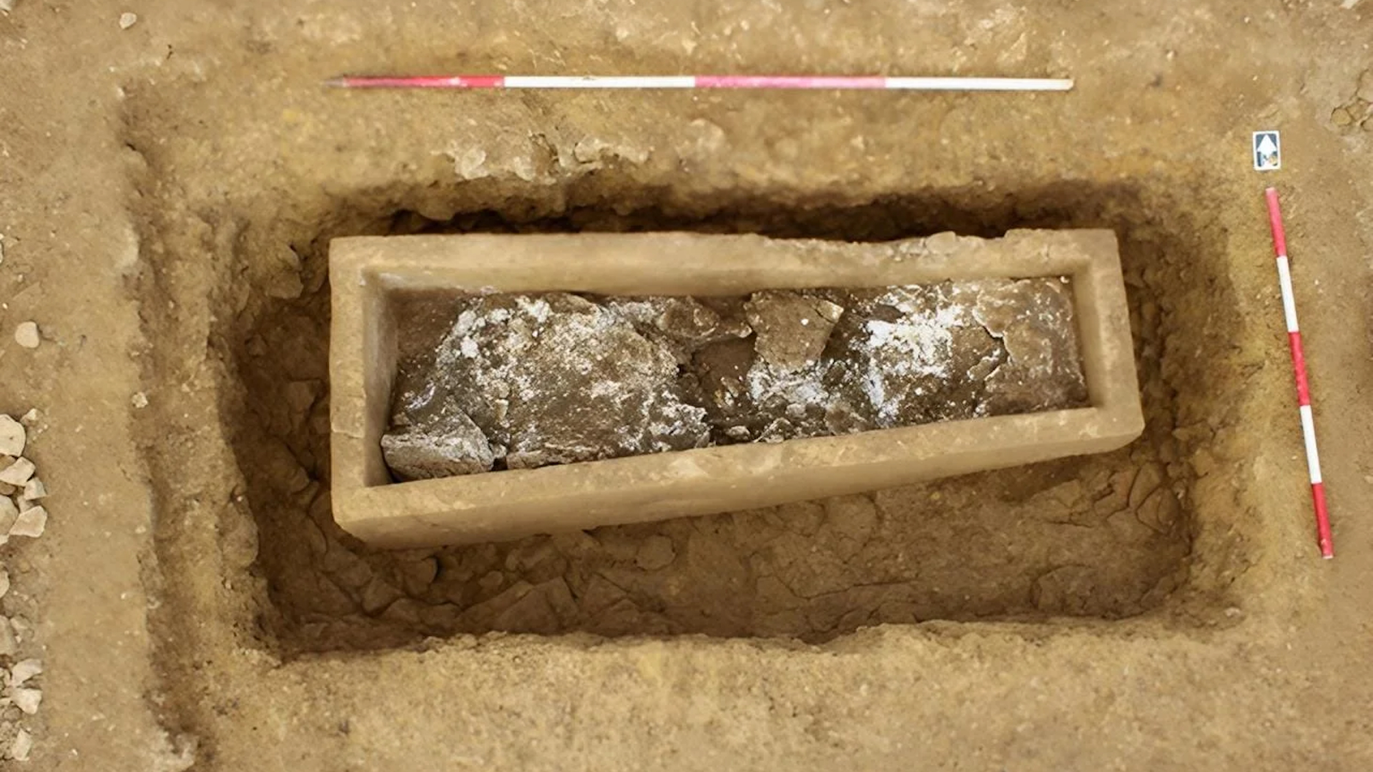 Roman stone coffin being excavated in England