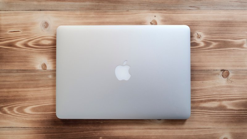 13-inch Apple MacBook Pro With Retina Display. Isolated on table.