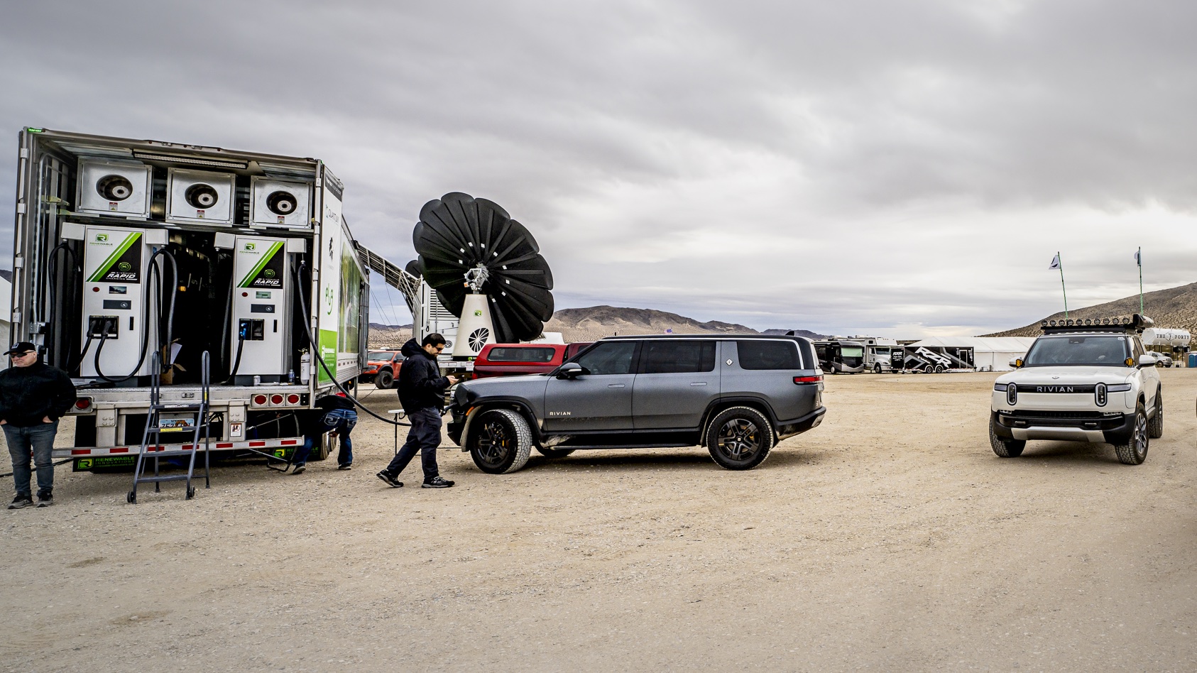 a semi truck trailer filled with electric chargers