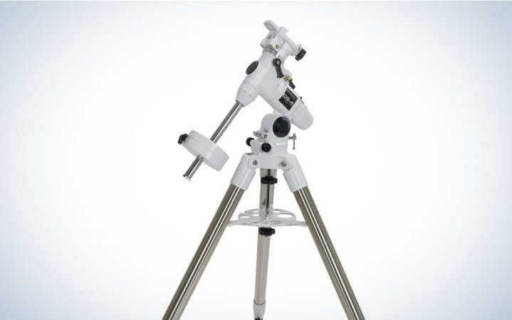  White and silver Celestron CG-4 German Equatorial Mount and Tripod on a grey gradient